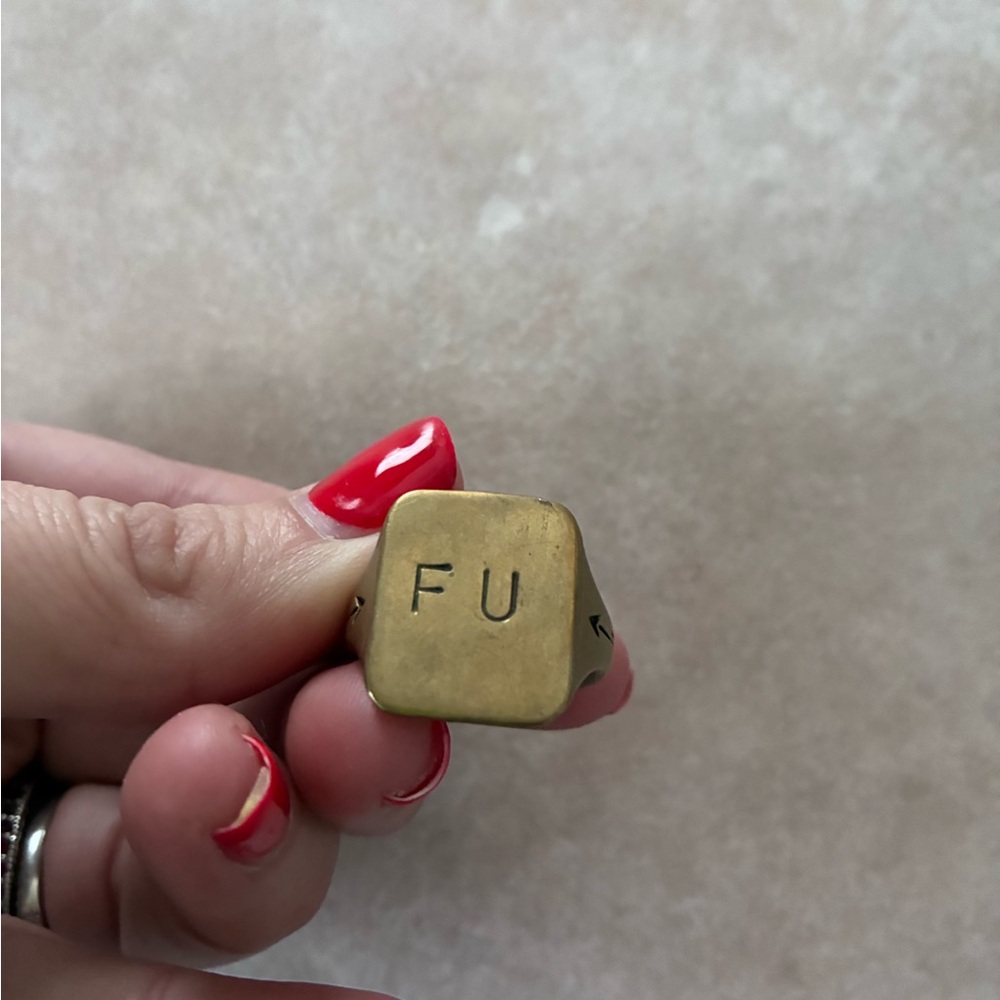 G & B’s Ring stamped with FU